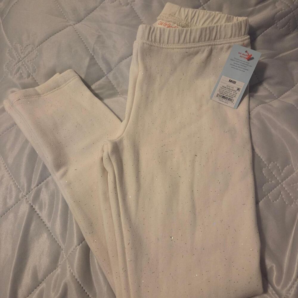 White sparkly leggings with small